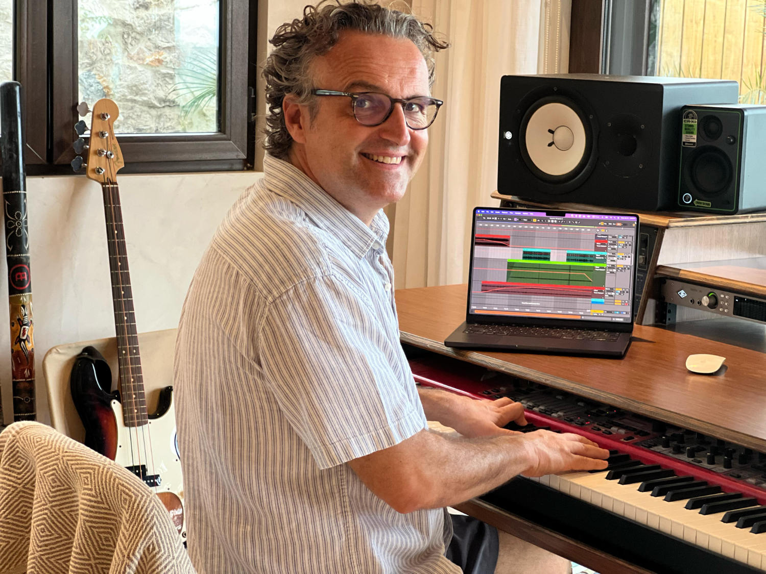 Film music composer and psychotherapist Bernard Becker Ph.D. preparing material for music therapy session.